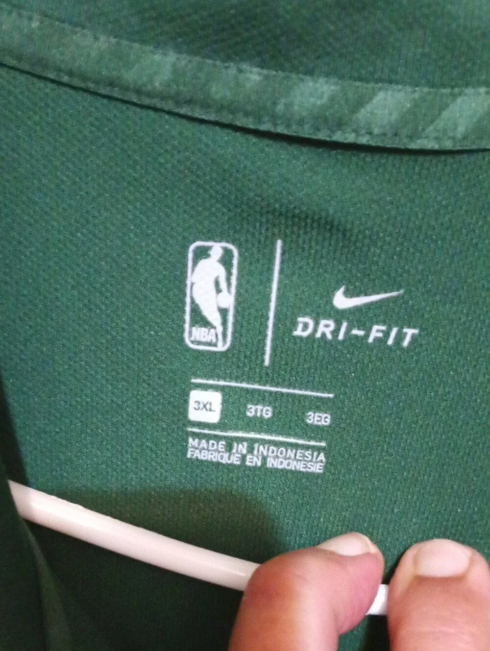 Nike Men’s Dark Green Bucks Polo with White Swoosh